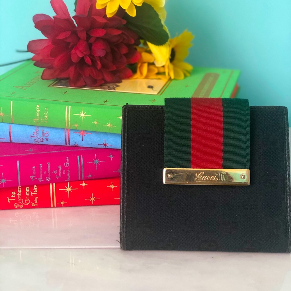 Gucci canvas bi fold wallet